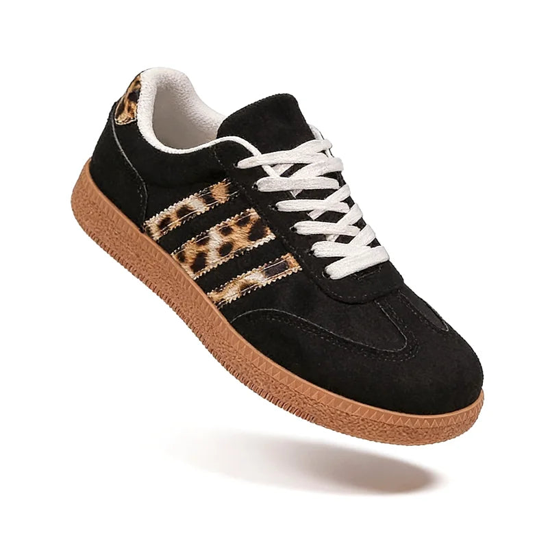 Retro zwarte sneakers met luipaardprint 