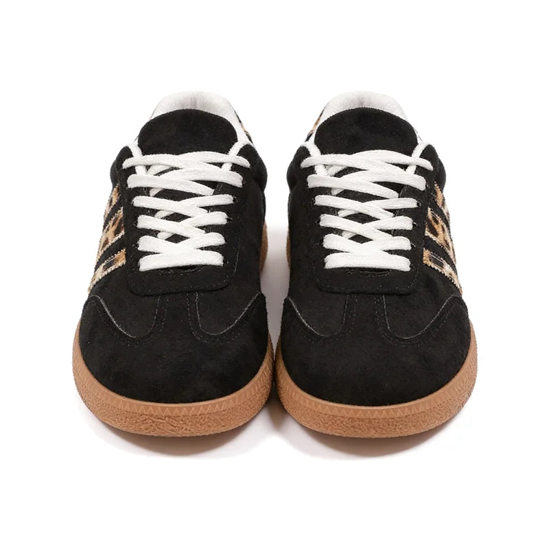 Retro zwarte sneakers met luipaardprint 