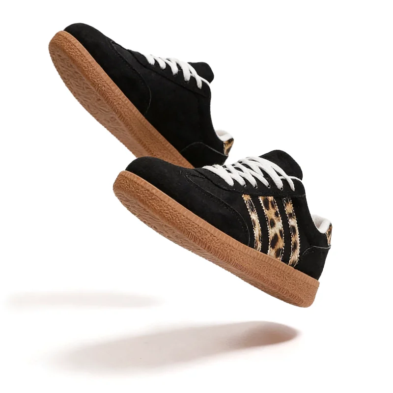 Retro zwarte sneakers met luipaardprint 