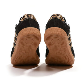 Retro zwarte sneakers met luipaardprint 