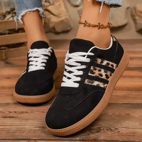 Retro zwarte sneakers met luipaardprint 