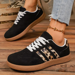 Retro zwarte sneakers met luipaardprint 